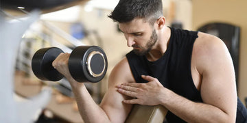 one arm dumbbell snatch